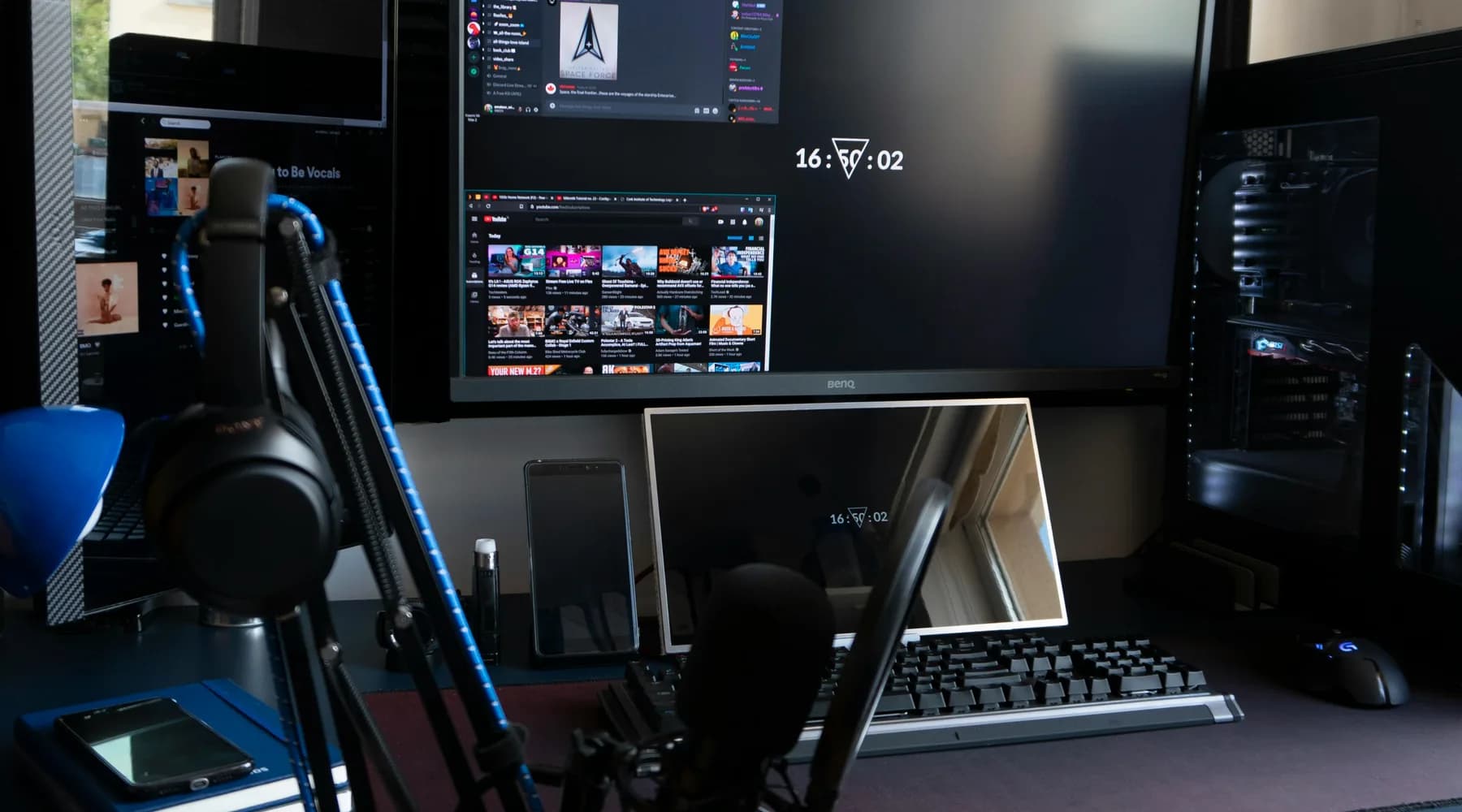 Creator desk setup with streaming monitors